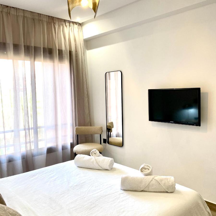 Appartement Rooftop Pool, Bright & Cozy In City Center Marrakesh